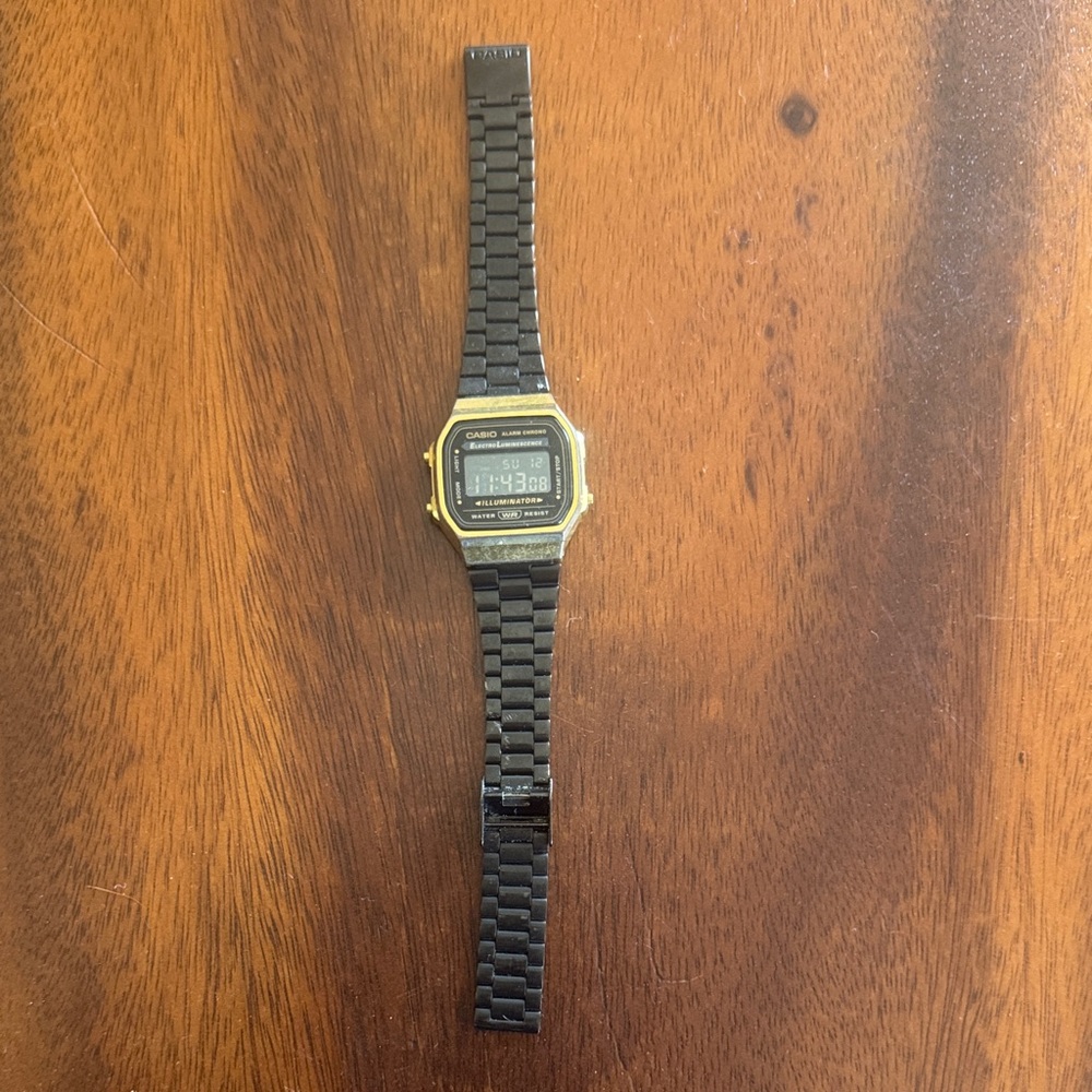 Casio Black and Gold Digital Timepiece